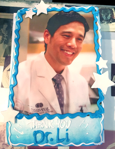 Cake with Dr Andrew Li's face on it.