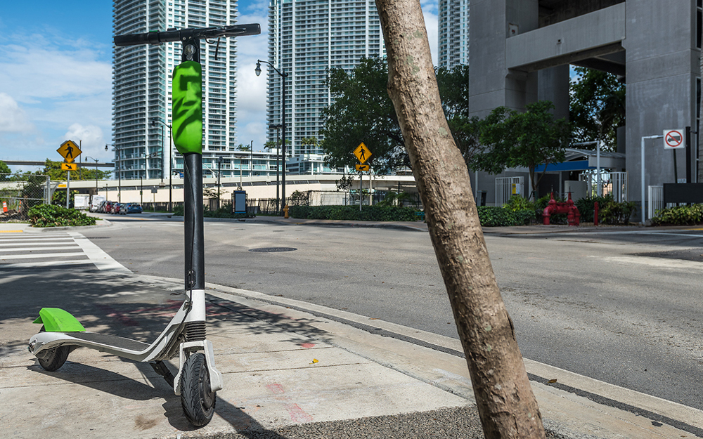 Electric scooter on the side of a street.
