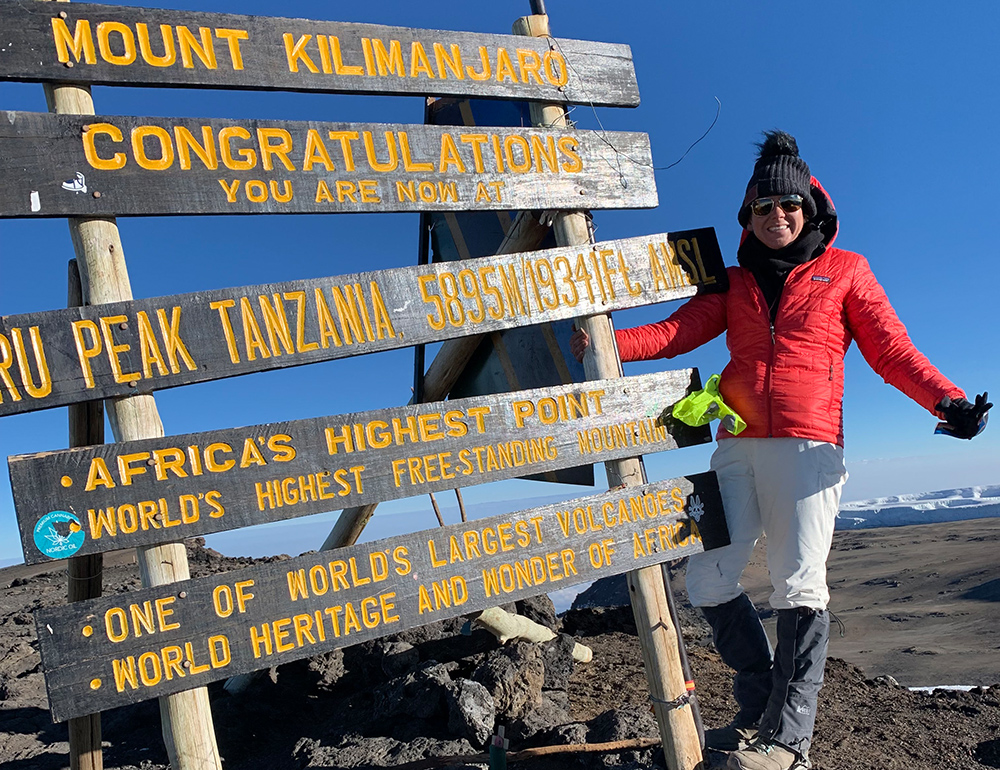 PICU nurse Jennifer Ross atop Kilimanjaro.