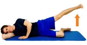 Man lying on his side doing hip abduction.