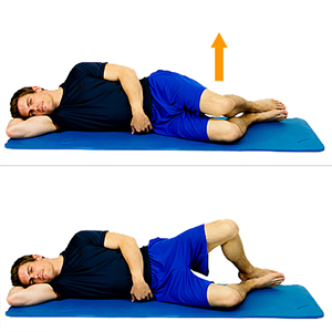 Man lying on his side doing the clamshell exercise.